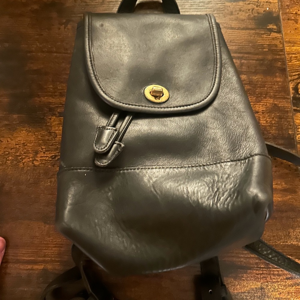 Coach Black and Gold Leather Backpack with Drawstring Flap Vintage